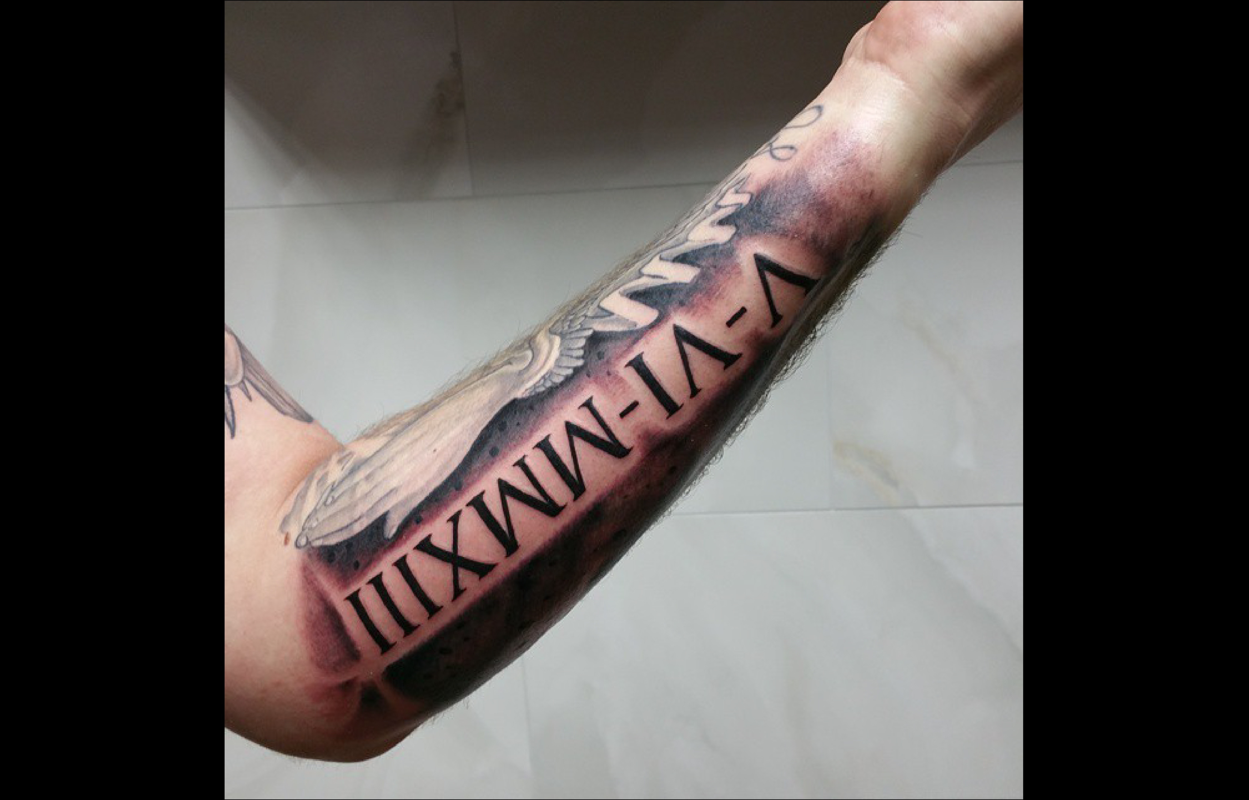 1996 en chiffre romain tatouage